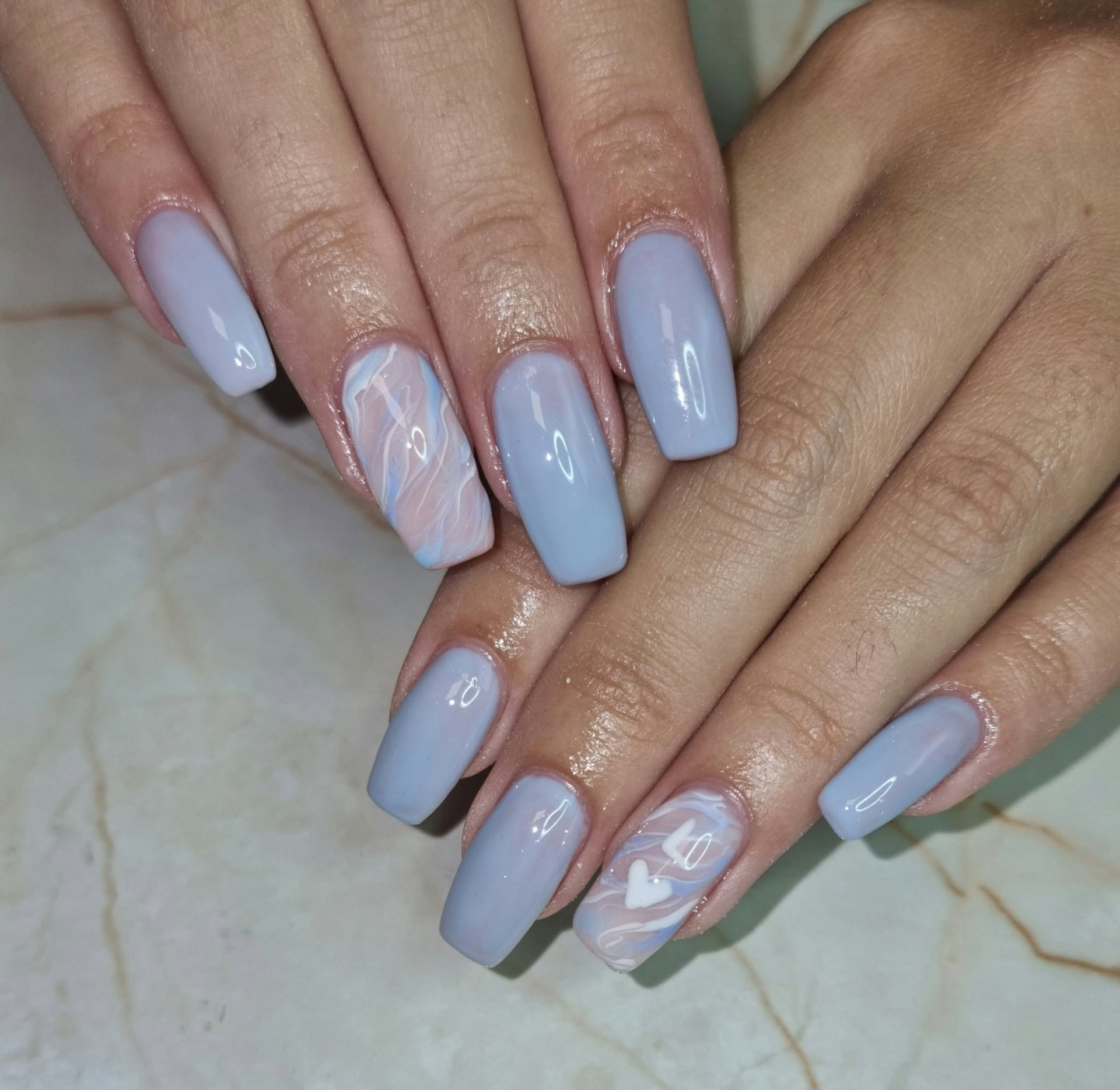 Soft Blue Marble Nails with Heart Detail