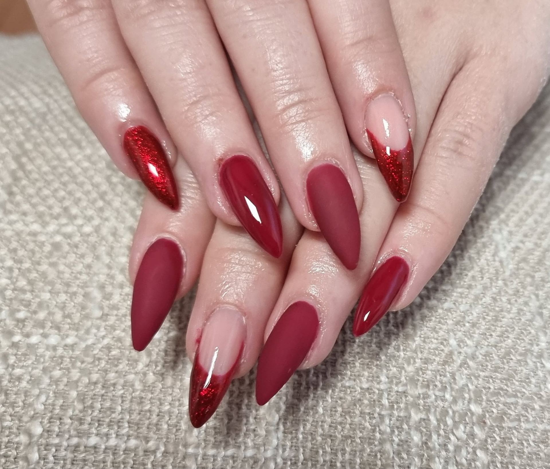 Deep Red Almond Nails with Glitter French Tips